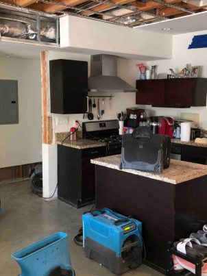 Board-up service securing a damaged property